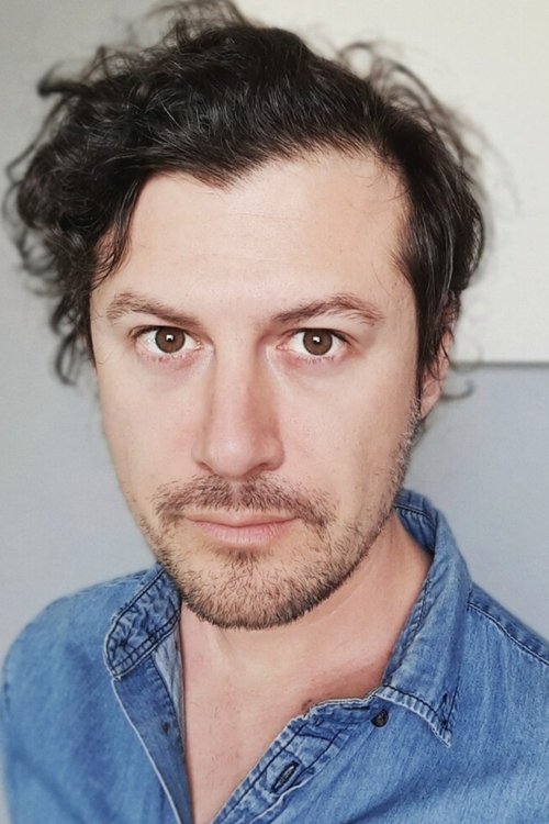 Rory Acton Burnell as Reporter #2