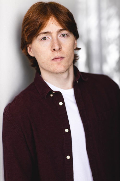 Adam House as Videographer