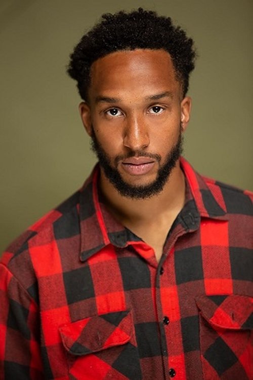 Lawrence Whitaker as Travis