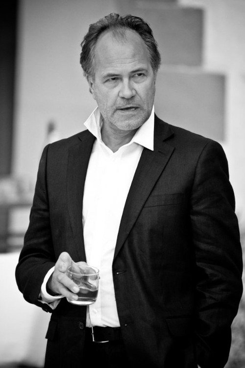 Hartmut Volle as Kriminalrat Junkers