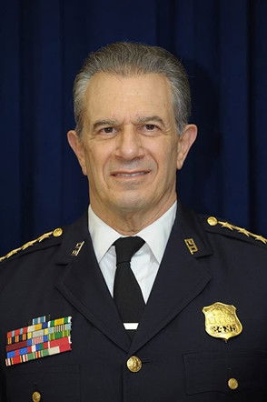 John De Bello as Policeman