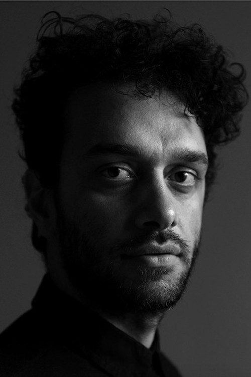 Barış Sarhan as Academician Enis