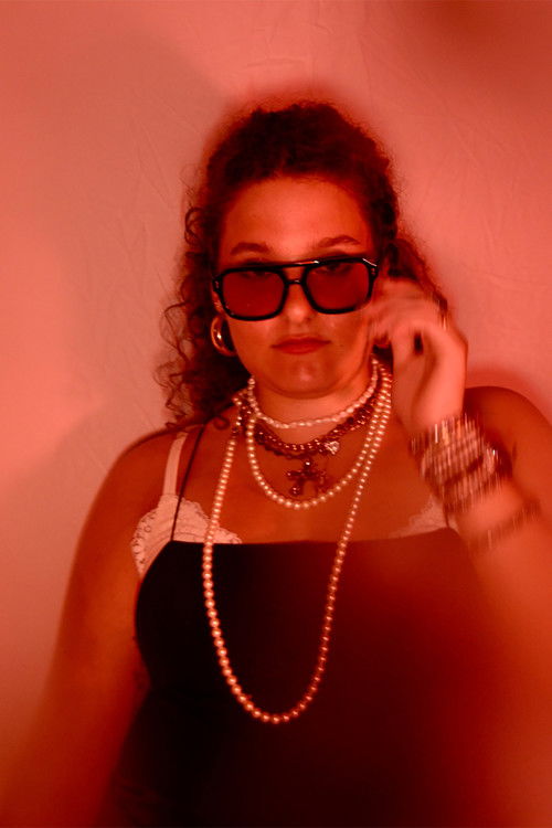 Ryan Elizabeth Brady as Secretary Cathy