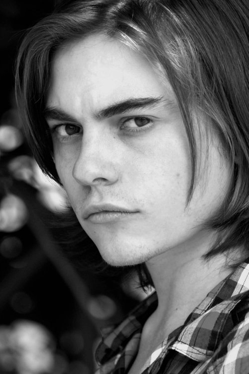 Maximillian Roeg as Adam