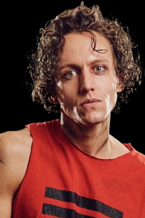 Glenn Adamson as Strat