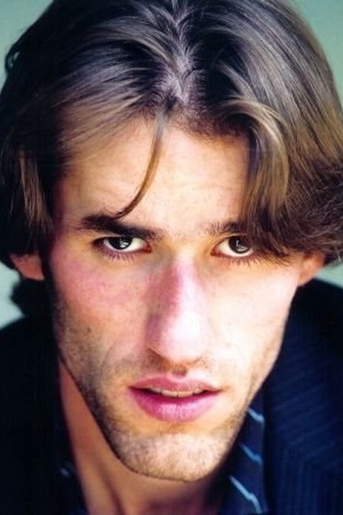 Nick Sowell as Record Shop Employee