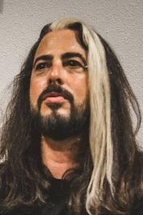 Phil Krazuki as Batteur de Megaveuch