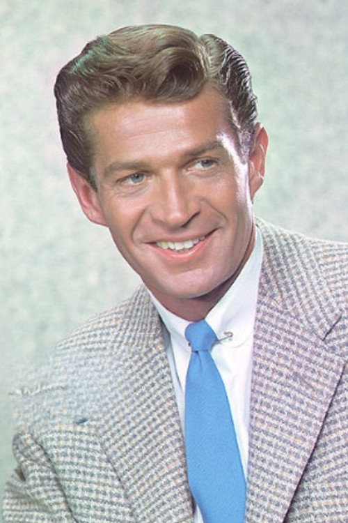 George Nader as Paul Baxter