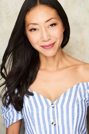 Jennie Baek as Passenger (uncredited)