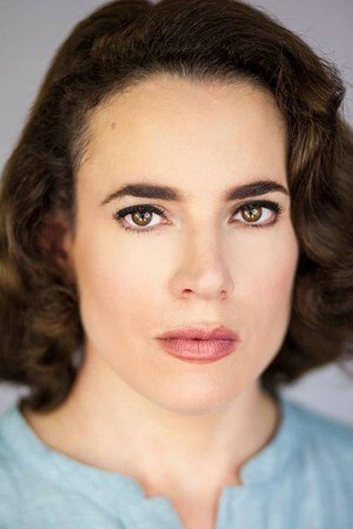 Beth Bartley as Parade Bystander 2