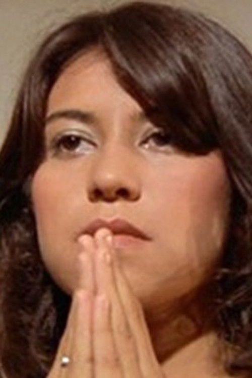 Évelyne Manta as Guest