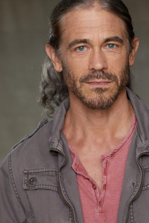 Eric Charles Jorgenson as Violinist