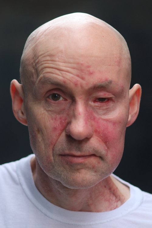 Andrew Elias as The Man on the Stairs