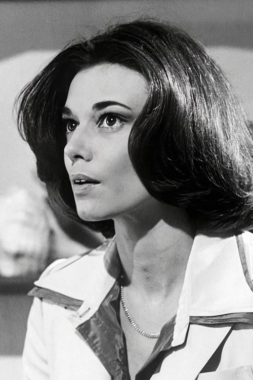 Tricia O'Neil as Sarah Lyons