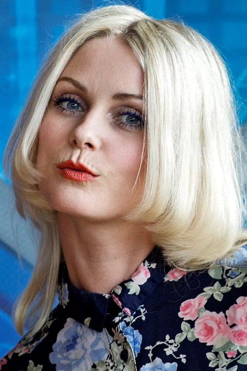 Mette Lindberg as Herself - Host/Coach