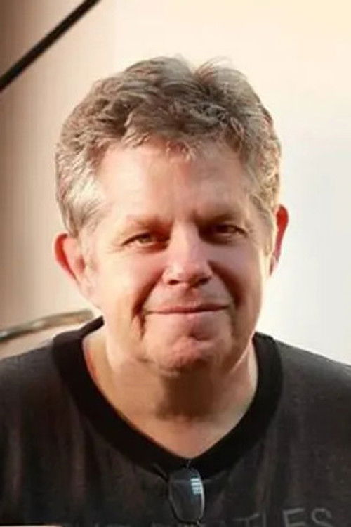 Len Davies as The dj