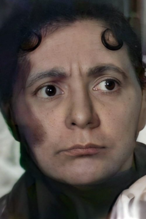 Laure Paillette as La cliente dans la rue