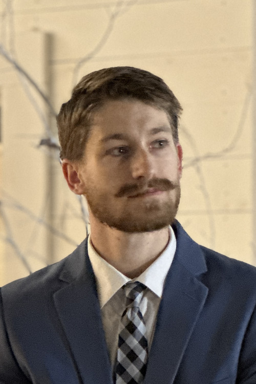 Koby Cormier as Unnamed Conspiracist