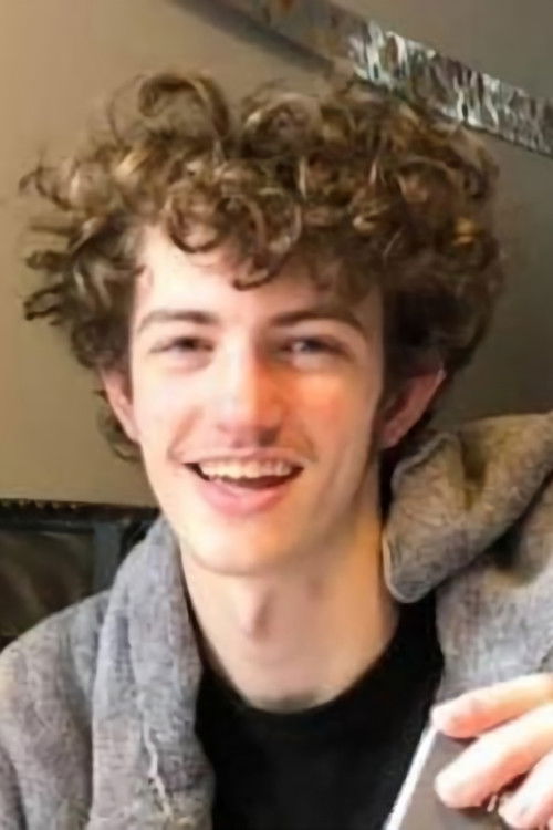 Dylan Mullin as Poker Player #1