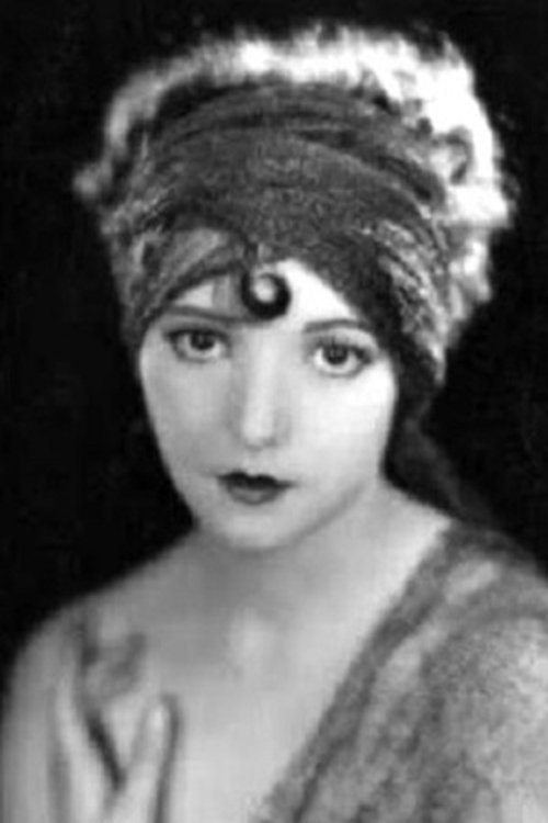 Thelma Parr as Wedding Guest