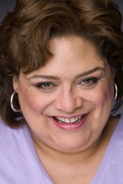 France Jean-Baptiste as Ms. Woodard