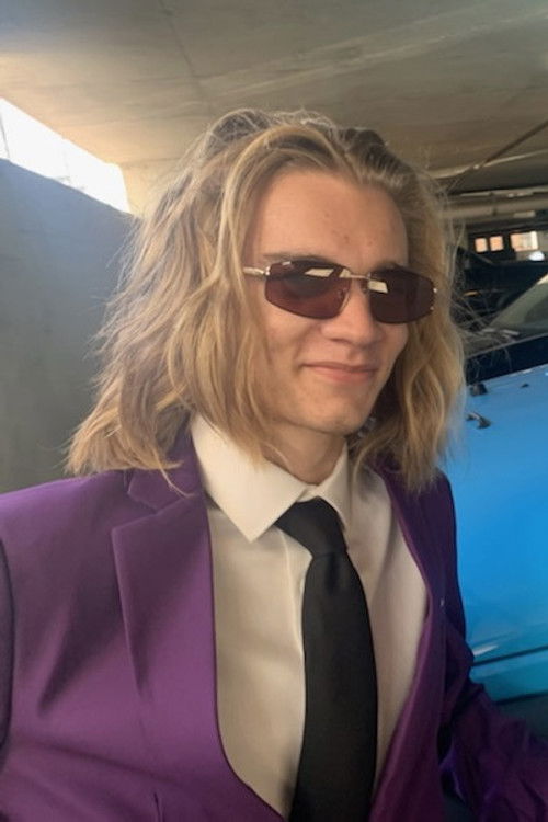 Austin Baltes as The Milkman