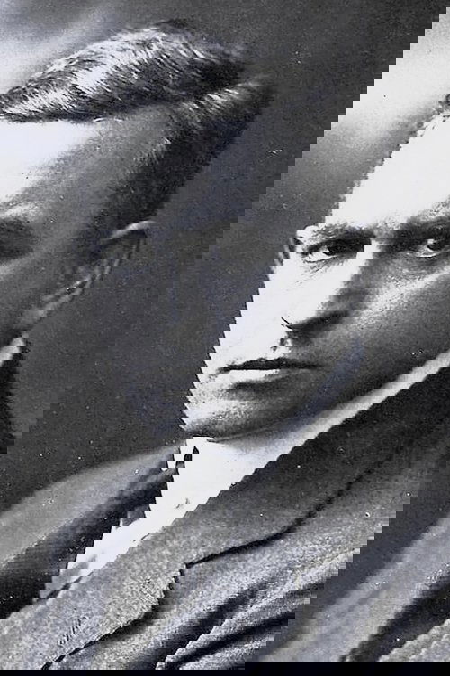 Ludwig Hartau as Yquem, the Broker