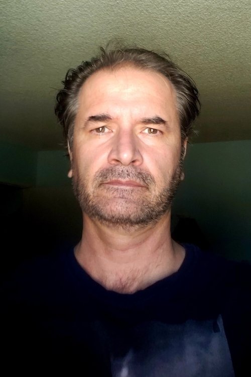 Joe Jagatic as Coroner Steve Zin