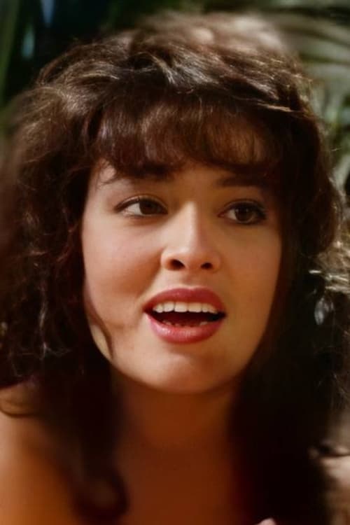 Roxanna Michaels as Genie (segment "Magic Beach")