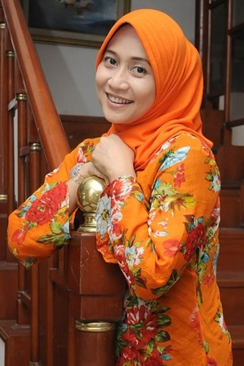 Meidiana Hutomo as Kyai Luthfi's Wife