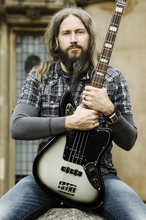 Troy Sanders as 