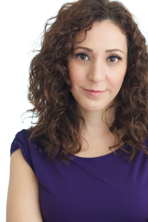 Elisa Dyann as Newscaster