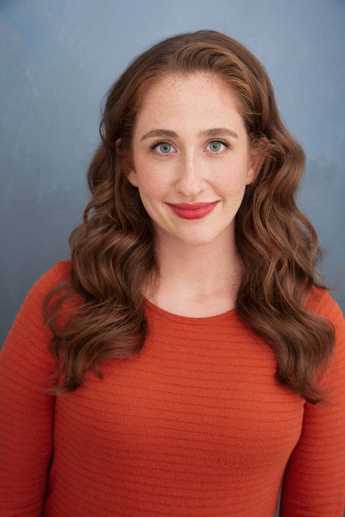 Caitlin Brodnick as Backstage Attendee/Movie Theater Audience Member