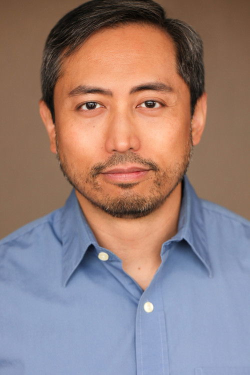 Michael Kuya as Ronnie Fernandez