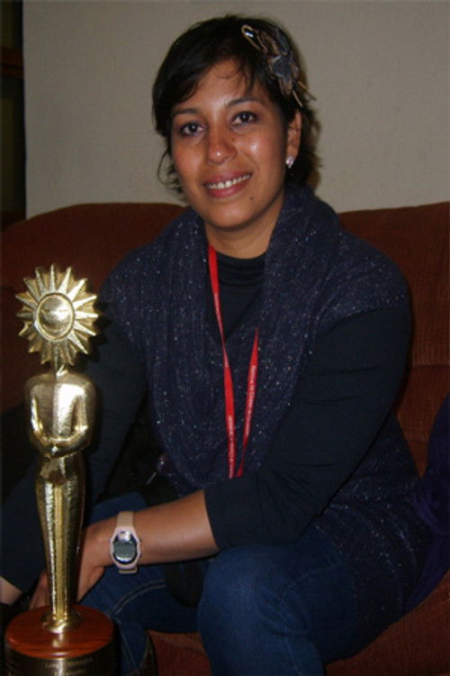 Alma Blanco as Virginia Roa 'La Yuma'