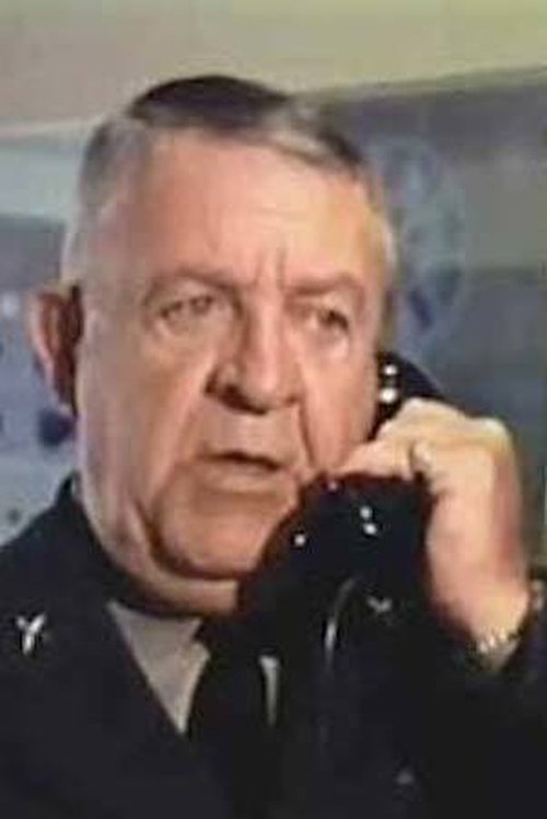 Neil Fletcher as Secretary of Defense