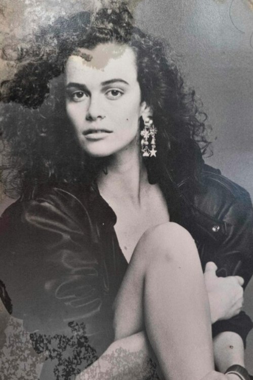 Betty Prado as Laura