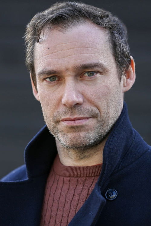 Niall Kenny as Adrian