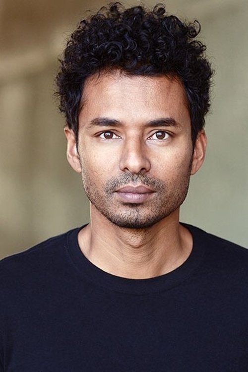 Anil Raman as Aaron