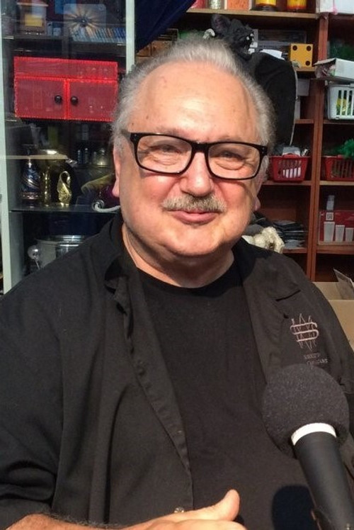 Andy Dallas as Shopkeeper