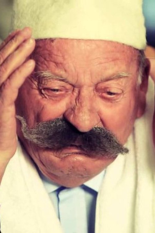 Albert Vërria as Kaporal Pelegrini