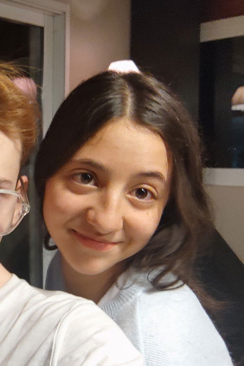 Paola Gómez as Class Student