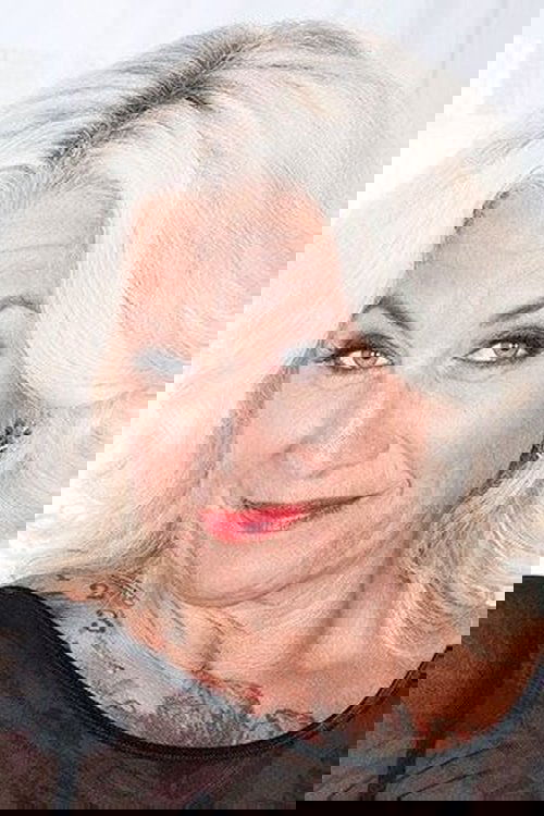 Amelia Mack as (archive footage)