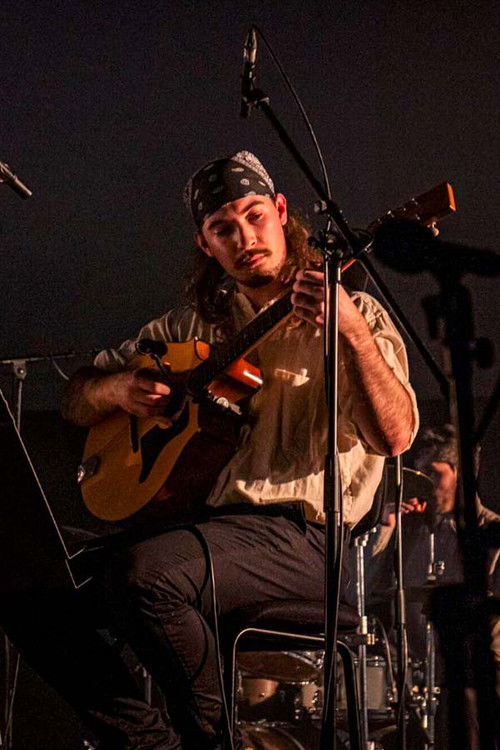 Joakim Nat as Violin Bard