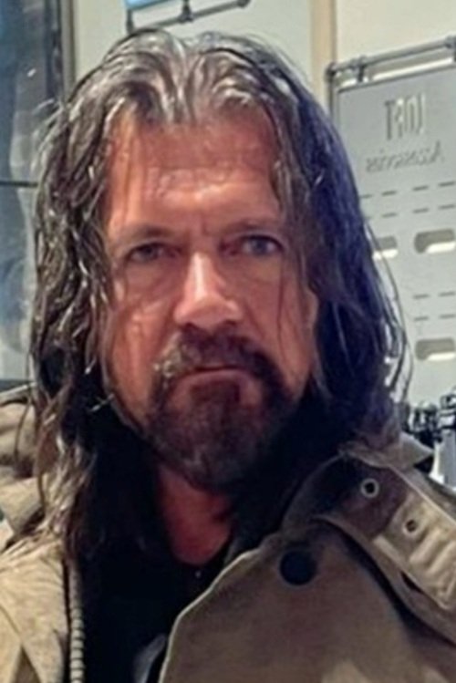 Gokhan Toprak as John