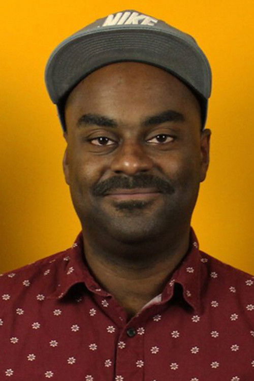 Shaun Diston as Black Maniac (segment "The Annum Triple Feature")