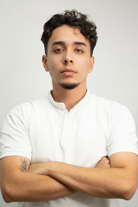 justin ledos as Adriano