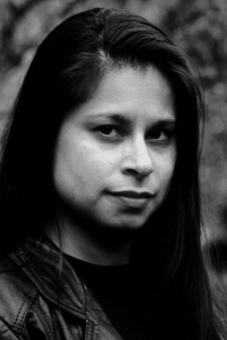 Michelle St. John as Komi / Amelia