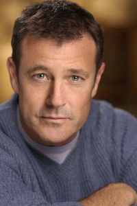 Tom McTigue as Priest