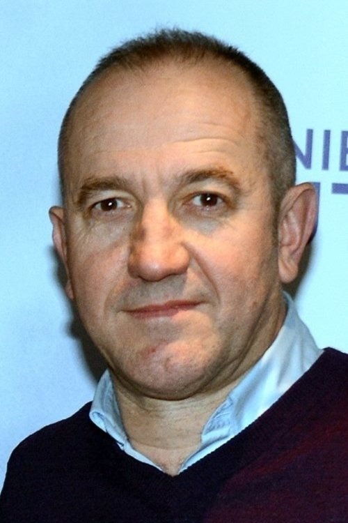 Philippe Claudel as L'entraîneur de tennis